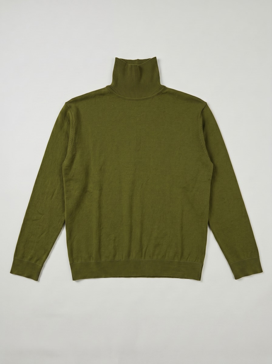 Wearing view of the olive green Training Turtleneck Sweater